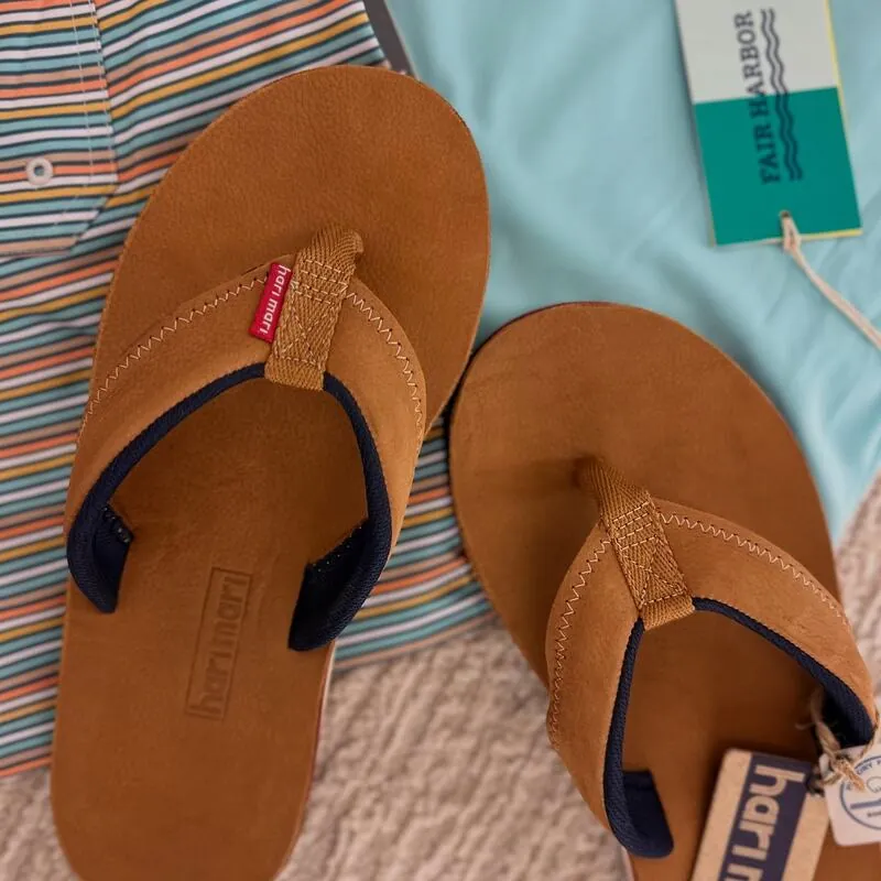 Leather flip-flops on a striped shirt